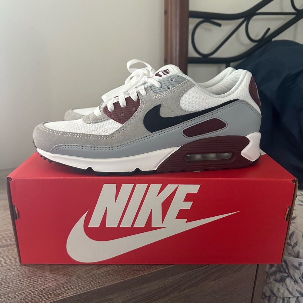 Nike Air Max 90 in a Team Red(maroon) colorway. Worn 1 time